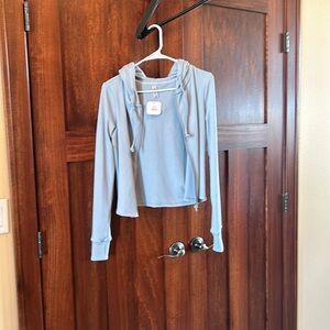 Zip up hoodie. Size M. NWT